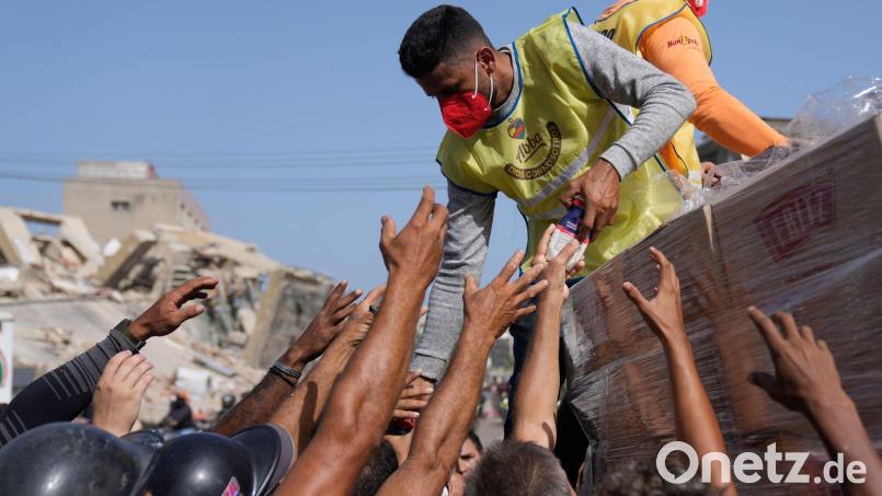 Mehr als 70.000 Familien wurden in La Guaira laut Behörden von den Erdbeben betroffen. Bild: Ariana Cubillos/AP/dpa