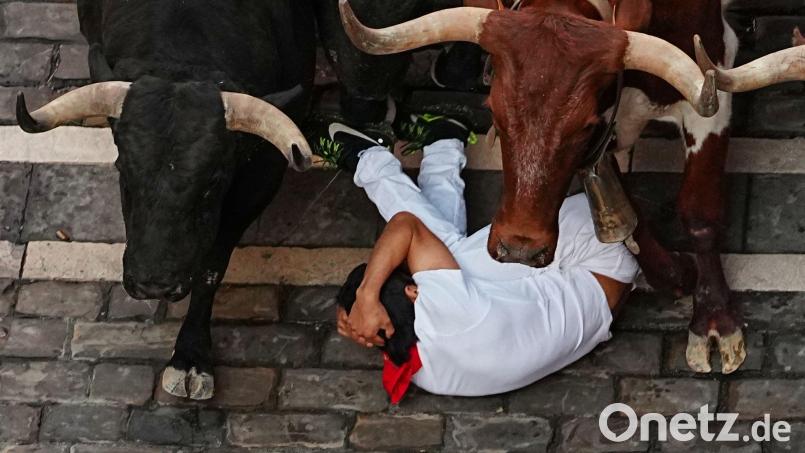 Bei der Stierhatz in Pamplona gab es viele Verletzte. Bild: Miguel Oses/AP/dpa