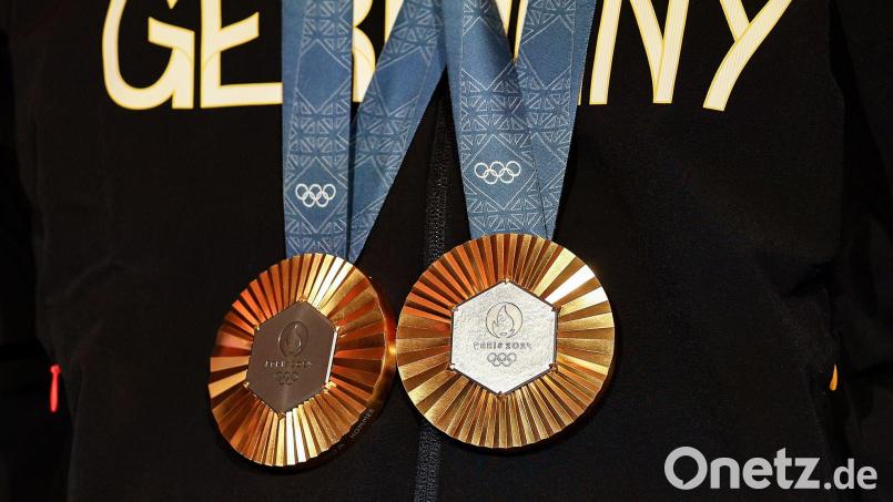 Gibt's bald mehr Medaillen bei Olympia? Das neue Sportfördergesetz soll auch dafür sorgen. (Archivbild) Bild: Jan Woitas/dpa