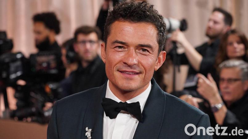 Orlando Bloom teilt sich sein Zuhause mit einem Pudel namens „Biggie Smalls“. (Archivbild) Bild: Jordan Strauss/Invision/AP/dpa