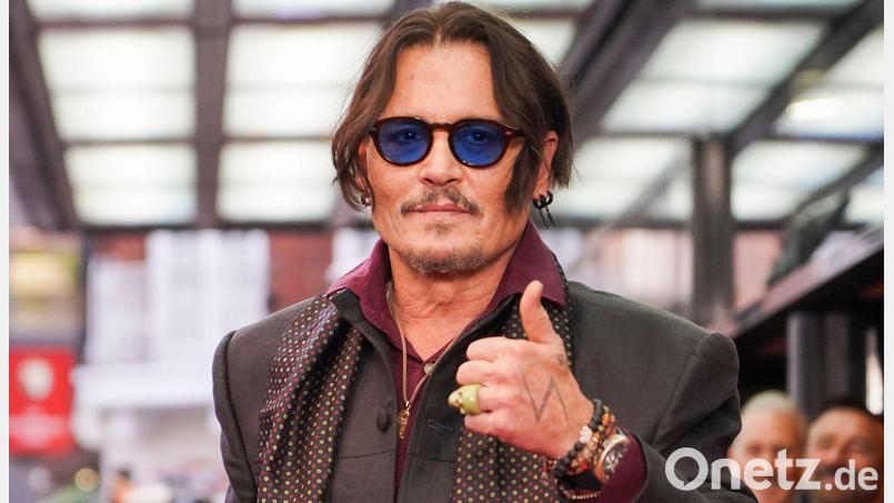 Johnny Depp spielt in seiner neuen Rolle den Griesgram Ebenezer Scrooge. (Archivbild) Bild: Alberto Pezzali/Invision via AP/dpa