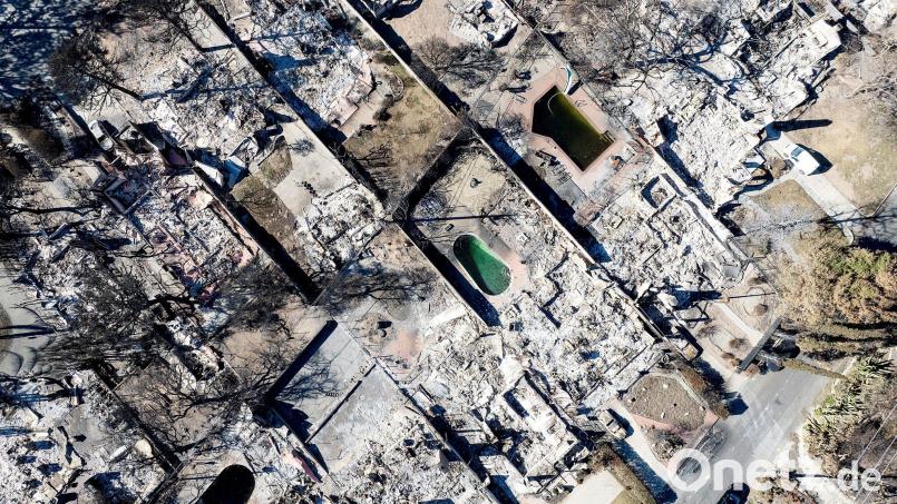 Die Ursache für das Eaton-Feuer wird auf einen Strommasten zurückgeführt. (Archivbild) Bild: Noah Berger/FR34727 AP/AP/dpa
