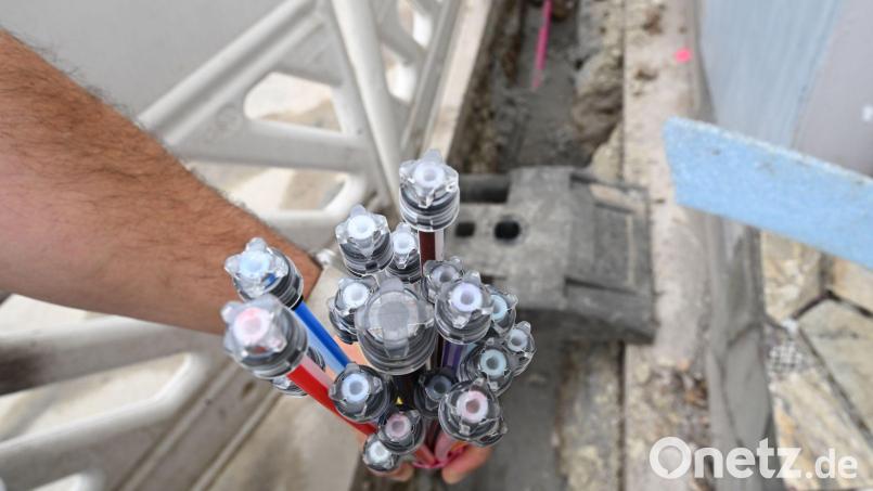 Ein Branchenbündnis fordert die freiwillige Öffnung der Glasfasernetze in Deutschland. Bild: Bernd Weißbrod/dpa
