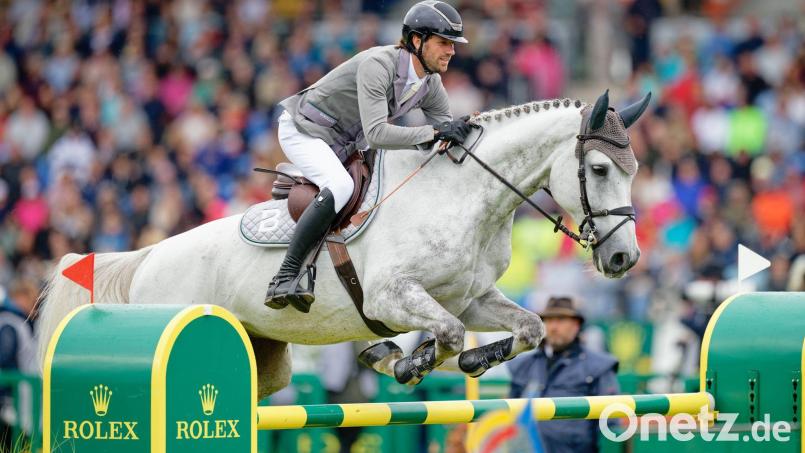 Raus aus dem Olympia-Kader: Christian Kukuk und sein Pferd Checker. (Archivbild) Bild: Uwe Anspach/dpa