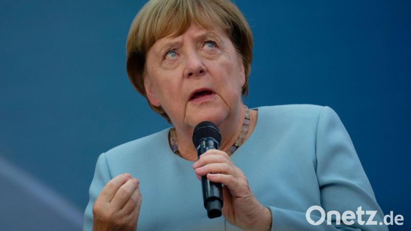 Angela Merkel sieht das faktenbasierte Denken und Argumentieren in Gefahr. Bild: Henning Kaiser/dpa