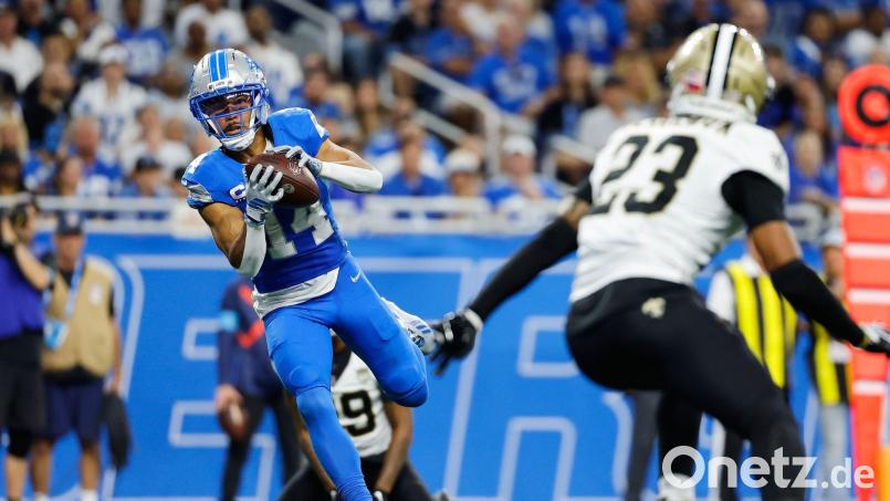 St. Brown (links) erzielte im ersten Saisonspiel zwei Touchdowns für die Lions. Bild: Rey Del Rio/AP/dpa