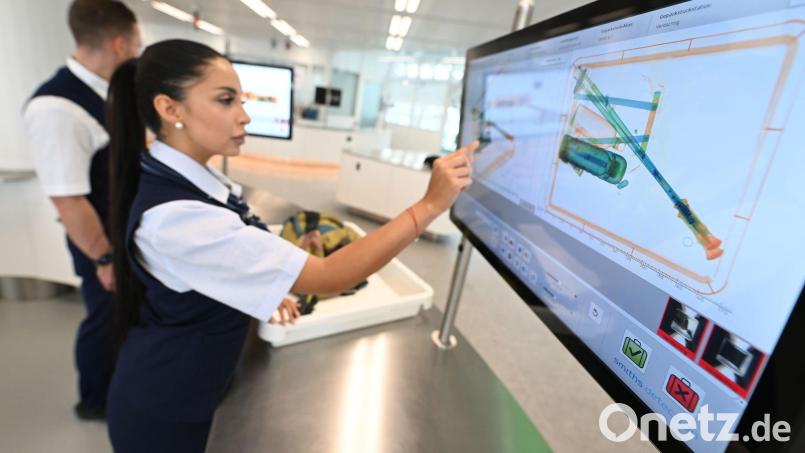 Moderne Technik machts möglich: Auch Laptops dürfen am Flughafen München künftig bei der Sicherheitskontrolle im Handgepäck bleiben. (Archivbild) Bild: Angelika Warmuth/dpa
