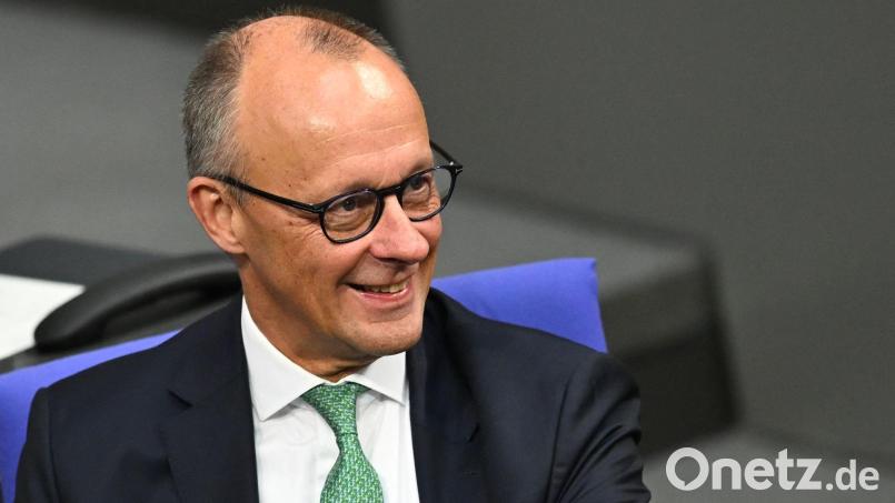 Bundeskanzler Friedrich Merz hofft auf Olympische Spiele in Deutschland und sichert der Bewerbung Münchens seine Unterstützung zu. (Archivbild) Bild: Michael Brandt/dpa