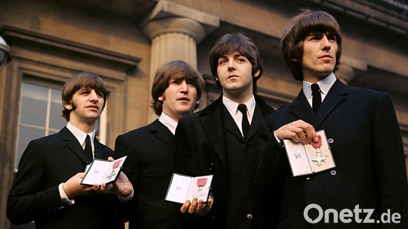 Während der Aufnahmen zu „Rubber Soul“ erhielten die Beatles von Königin Elizabeth II. den MBE-Orden. (Archivbild) Bild: Pa/PA Wire/dpa