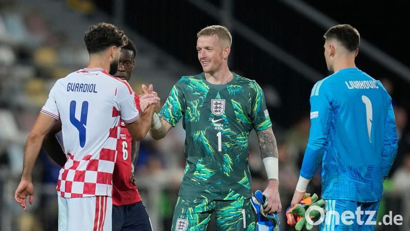 Jordan Pickford (M) muss sich vor Gericht verantworten. Bild: Darko Bandic/AP/dpa