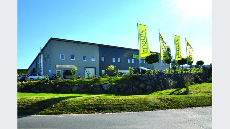Das Firmengebäude der Impuls Mediengruppe im Gewerbepark in Erbendorf. Bild: exb