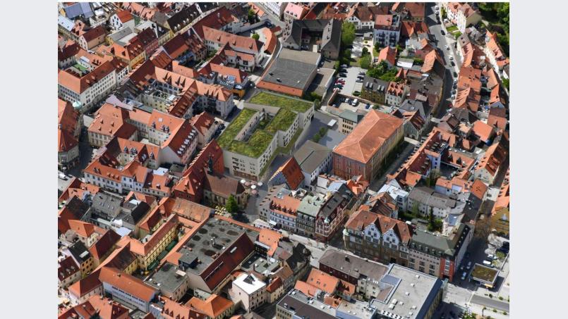 Die Luftbild-Animation zeigt, wie sich die Bebauung in das Stadtbild einfügt. Bild: exb/Ten Brinke