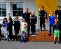 So klein und schon so schnell: 110 Buben und Mädchen gehen beim Nordostbayerischen Kart-Wettbewerb auf dem Ach-Gelände an den Start. Für die schnellsten Nachwuchs-Piloten gibt es Pokale.