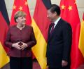 Bereits 2015 wurde Angela Merkel von Xi Jinping in Peking begrüßt. Nun ist die Kanzlerin erneut in China.  	Archivbild: Soeren Stache/dpa