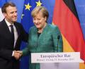 Bild: Vanden Wijngaert/AP/dpa
Bundeskanzlerin Angela Merkel (CDU) und der französische  Präsident Emmanuel Macron.