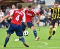 Bild: Alfred Schwarzmeier
Dieser Schuss des Grafenwöhrers Markus Kraus (rechts) verfehlt das Ziel, dennoch jubelte am Ende der Bezirksliga-Rückkehrer. Beim SV Kulmain gelang den Grafenwöhrern ein 2:1-Auftaktsieg.