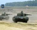 Bild: Holger Hollemann/dpa
Schützenpanzer vom Typ „Puma“ fahren während einer Schießübung über das Erprobungsgelände des Unternehmens Rheinmetall in Niedersachsen.