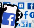 Bild: Symbolbild: Dominic Lipinski/PA Wire/dpa
Das Facebook-Logo auf dem Display eines Smartphones.