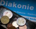 Bild: Arno Burgi/dpa
Wenn die Schulden drücken oder gar eine Privatinsolvenz ansteht, führt der Weg oft zu den Beratungsstellen der Diakonie.
