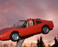 Bild: Gabi Schönberger
Ganz in rot: Eine Barbie sitzt in einem Ferrari.