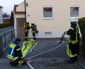 Bild: hme
Die Atemschutzträger der Oberwildenau Wehr, kurz bevor sie das Brandobjekt betreten.