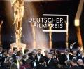 Bild: Britta Pedersen/dpa
Preisträger, Laudatoren und Redner stehen nach der Verleihung des 69. Deutschen Filmpreises "Lola" auf der Bühne