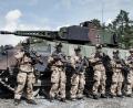 Bild: Bundeswehr/Norman Möller
Soldaten des Panzergrenadierbataillons 112 aus Regen stehen neben ihrem Panzer beim ersten Gefechtsschießen mit dem neuen Schützenpanzer Puma auf dem Truppenübungsplatz Grafenwöhr,