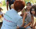 Bild: hcz
Geduldig schminkt Margareta Czichon von den Freunden des Stadtbads ein Kind nach dem anderen. Nuzay, Milana und Raul (von rechts) freuen sich.