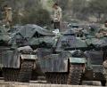 Bild: Lefteris Pitarakis/dpa
Türkische Soldaten bereiten in der Nähe des Dorfs Sugedigi (Türkei) an der Grenze zu Syrien ihre Panzer vor. Bei der Militäroffensive in Nordwestsyrien sind türkische Truppen nach Angaben der Staatsagentur Anadolu weiter gegen kurdische Milizen vorgerückt.