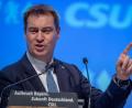 Bild: Peter Kneffel/dpa
Markus Söder spricht beim CSU-Parteitag in der Olympiahalle.