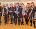 Bunt wie das Herbstlaub war das Programm, mit dem die Flötenladies unter der Leitung von Ulrike Dziwinski (Sechste von links) die Zuhörer erfreuten