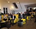 Bild: ubb
Die Gäste lauschten den Referenten (hier Anton Braun, rechts) in der C3-Mitarbeiterlounge von bequemen Ohrensesseln aus oder auf der Couch.