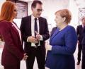 Bild: Xander Heinl/photothek.net
Barbara Meier, Gerd Müller und Angela Merkel im Futurium in Berlin.