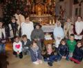 Bild: soj
Die Kommunionkinder und der Kinderchor gestalteten die eindrucksvolle Kinderchristmette mit.