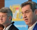 Bild: Peter Kneffel/dpa
Kultusminister Michael Piazolo (links, Freie Wähler) und Ministerpräsident Markus Söder (CSU verkünden nach dem Digitalisierungsgipfel die nächsten Schritte an den Schulen.