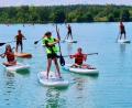 Bild: ads
Sportlich, sportlich: Die Kinder der KjG St. Michael beim Stand-Up-Paddling auf dem Murner See.