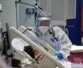 Bild: Cecilia Fabiano/dpa
Das medizinische Personal der Intensivstation der COVID-19-Klinik Casalpalocco am Stadtrand von Rom kümmert sich um die Patienten. Italien registrierte am Donnerstag knapp 1.400 neue Fälle, 71 mehr als am Vortag.