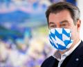 Bild: Sven Hoppe
Markus Söder (CSU) unterhält sich vor Beginn einer Sitzung des bayerischen Kabinetts mit Journalisten. Foto: Sven Hoppe/dpa/Archivbild