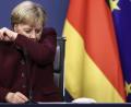 Bild: Kenzo Tribouillard/dpa
Bundeskanzlerin Angela Merkel räuspert sich.