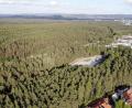 Bild: Gustl Beer
Blick auf die Waldflächen, auf denen das Gewerbegebiet Weiden West IV nördlich der B 470 entstehen soll. Im Vordergrund die Brandweihersiedlung mit der Panzerwaschanlage und den Gebäuden von Weiden-West III.