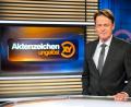 Bild: Sina Schuldt
ZDF-Moderator Rudi Cerne im Studio der Sendung „Aktenzeichen XY ... ungelöst“. Foto: Sina Schuldt/dpa/Archivbild