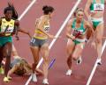 Bild: Oliver Weiken/dpa
Leichtathletik: Olympia, 4 x 400 m, Mixed, Finale im Olympic Stadium. Deutschlands Nadine Gonska (3.v.l) verliert den Stab.