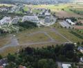 Bild: Gustl Beer
Mit dem Verkauf der Bürgerbräu GmbH geht auch der alte Festplatz mit seinen 47.000 Quadratmetern am Hetzenrichter Weg in neue Hände über. Im Hintergrund (von rechts) Schützenhaus, E-House, FOS/BOS und Technische Hochschule sowie das Areal des TC Am Postkeller.