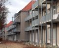 Bild: Wolfgang Steinbacher
Das ehemalige Bettenhaus: Außen ist die Sanierung beendet, im Inneren warten alle 119 Wohnungen auf den Ausbau.