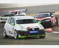Bild: Familie Härtl, Wiesau/exb
Werner Härtl am Steuer des VW Golf V GTI. Das Foto wurde am Nürburgring aufgenommen. Rechts dahinter - im Audi RS3 - fährt der Vorjahresmeister in der Tourenwagenklasse bis 2000 Kubikzentimeter, Dr. Thilo Körnig.