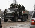 Bild: Konstantin Mihalchevskiy/Sputnik/dpa/Archivbild
Russische Soldaten auf einem Militärlastwagen.