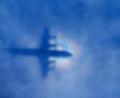 Bild: ROB GRIFFITH/EPA pool/dpa
Eine Maschine der Royal New Zealand Air Force P3 Orion sucht nach der vermissten Maschine des Flugs MH370 der Malaysia Airlines.