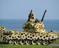 Archivbild: Carsten Rehder
Vor zwölf Jahren wurden die Flugabwehrpanzer vom Typ Gepard ausgemustert. Deshalb war dieser auf dem Schießplatz im schleswig-holsteinischen Todendorf in dieser Sonderfarbe lackiert worden.