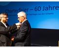 Bild: Tobias Riedl/exb
Pastpräsident Karlhermann Schötz (links) übergibt das Amt des Präsidenten an Heinz Schlosser.