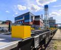 Bild: Hösamer
Die neuen Spezial-Bahnwagen für die Müllcontainer des ZMS stehen am Gleisanschluss des Kraftwerks bereit.